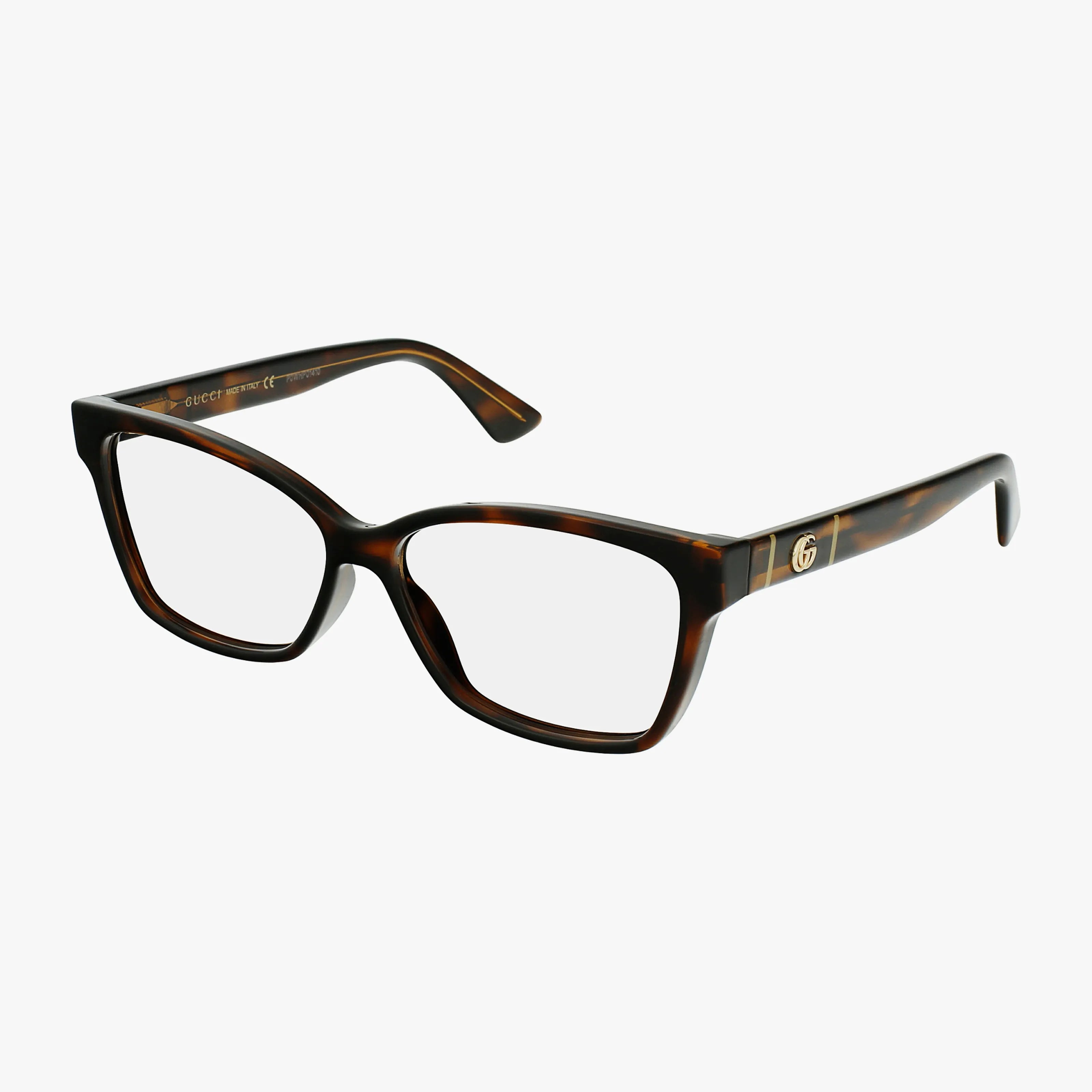 The GG0634O eyeglass frames feature a tortoiseshell rectangular design, clear lenses, and a gold Gucci logo on the arms, shown on a white background.