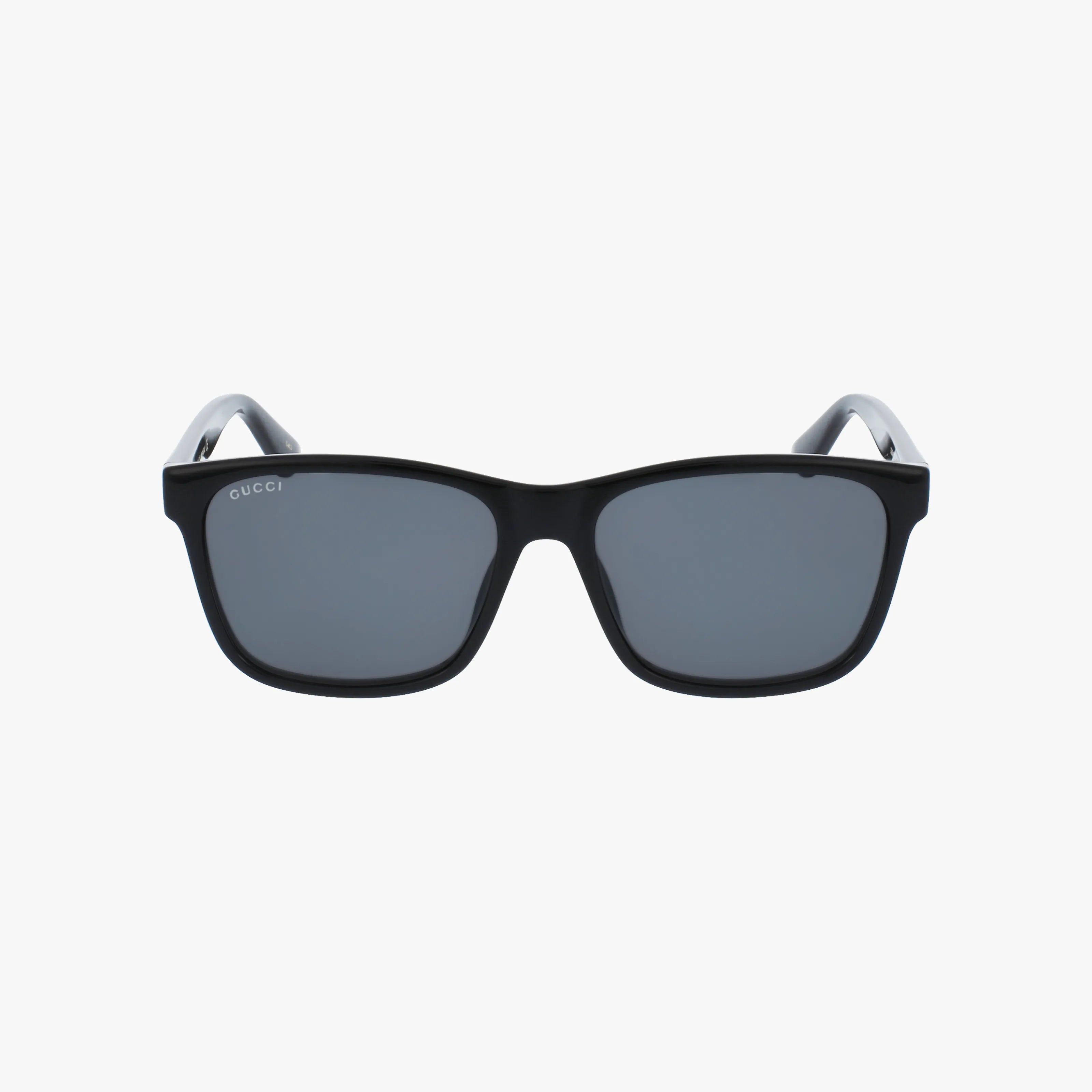 The GG0746S sunglasses feature a black rectangular frame with dark lenses and white interior arms, shown on a plain white background.