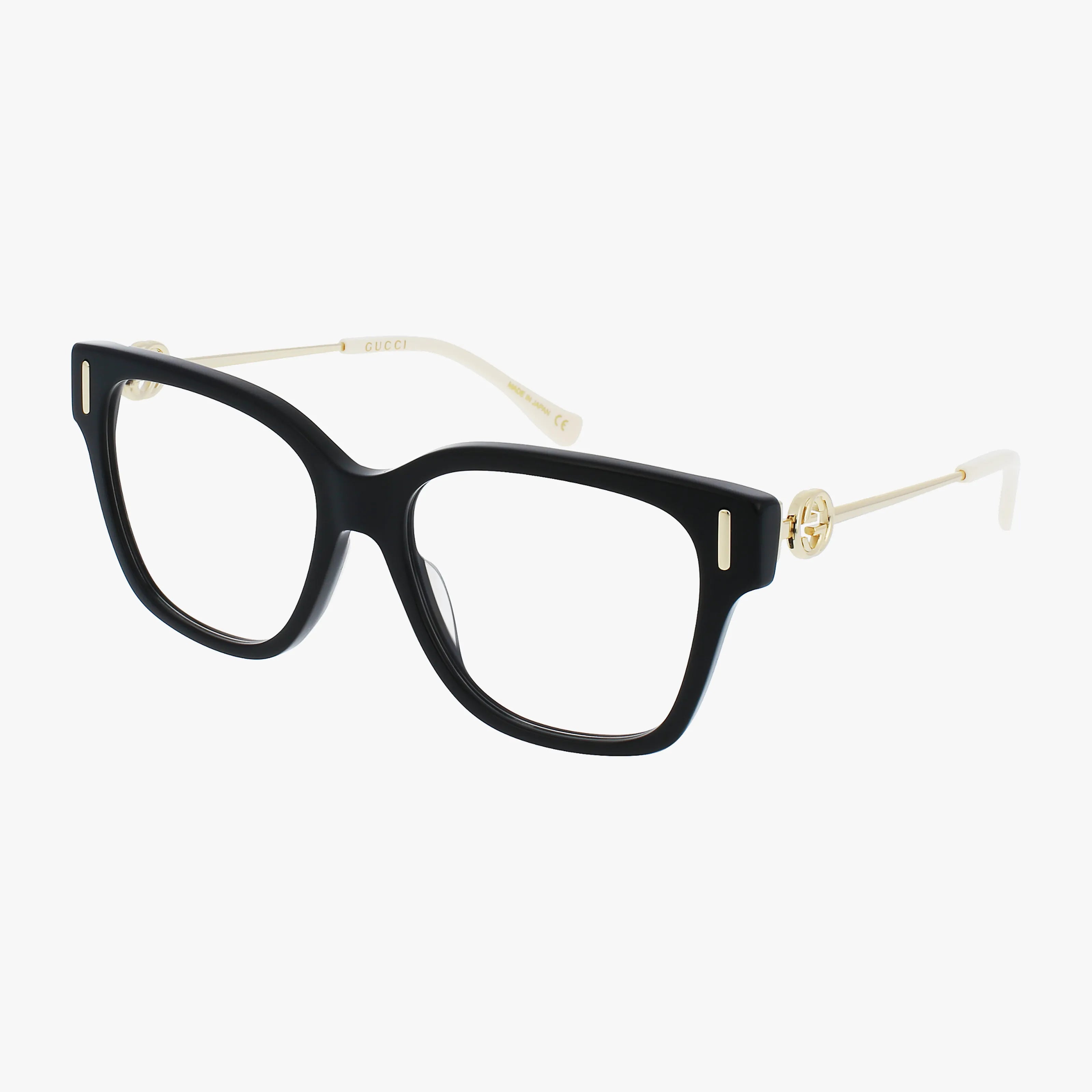 GG1204O designer glasses feature thick black rectangular fronts, slim gold metal arms with gold accents near the hinges, and white temple tips—an elegant Gucci eyewear piece displayed on a white background.