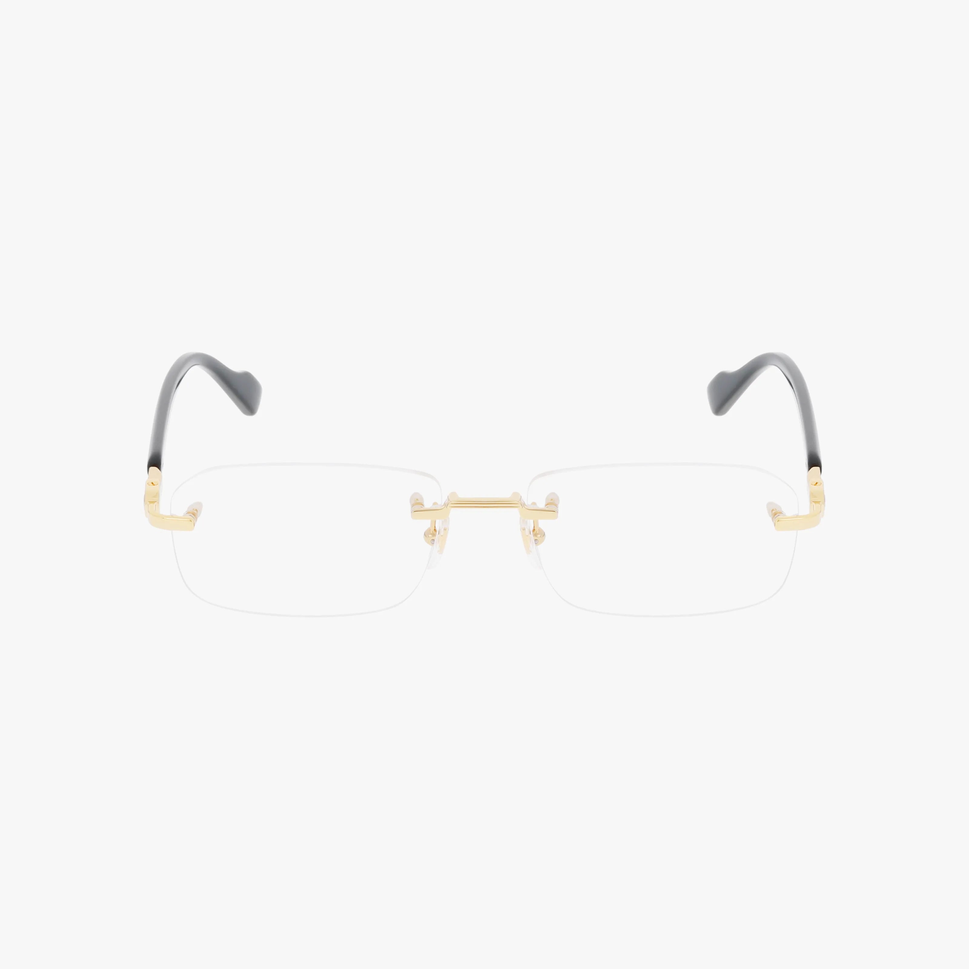 The GG1221O rimless eyeglasses feature gold metal arms, a gold nose bridge, and black temple tips for a sleek, modern look, shown on a plain white background.