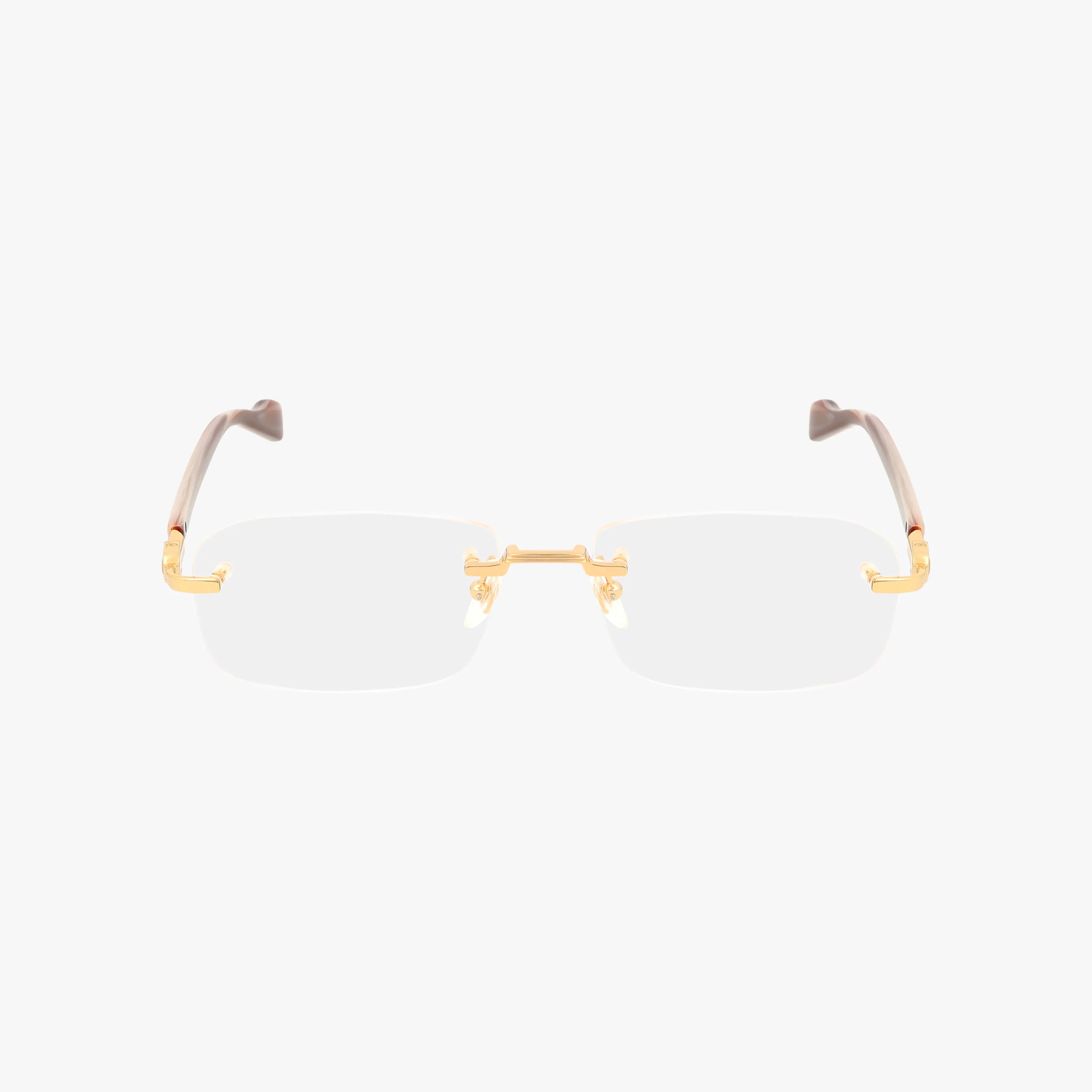 The GG1221O rimless eyeglasses feature a gold metal nose bridge and hinges with brown temple arms, creating a tailored modern look. Shown on a plain white background.