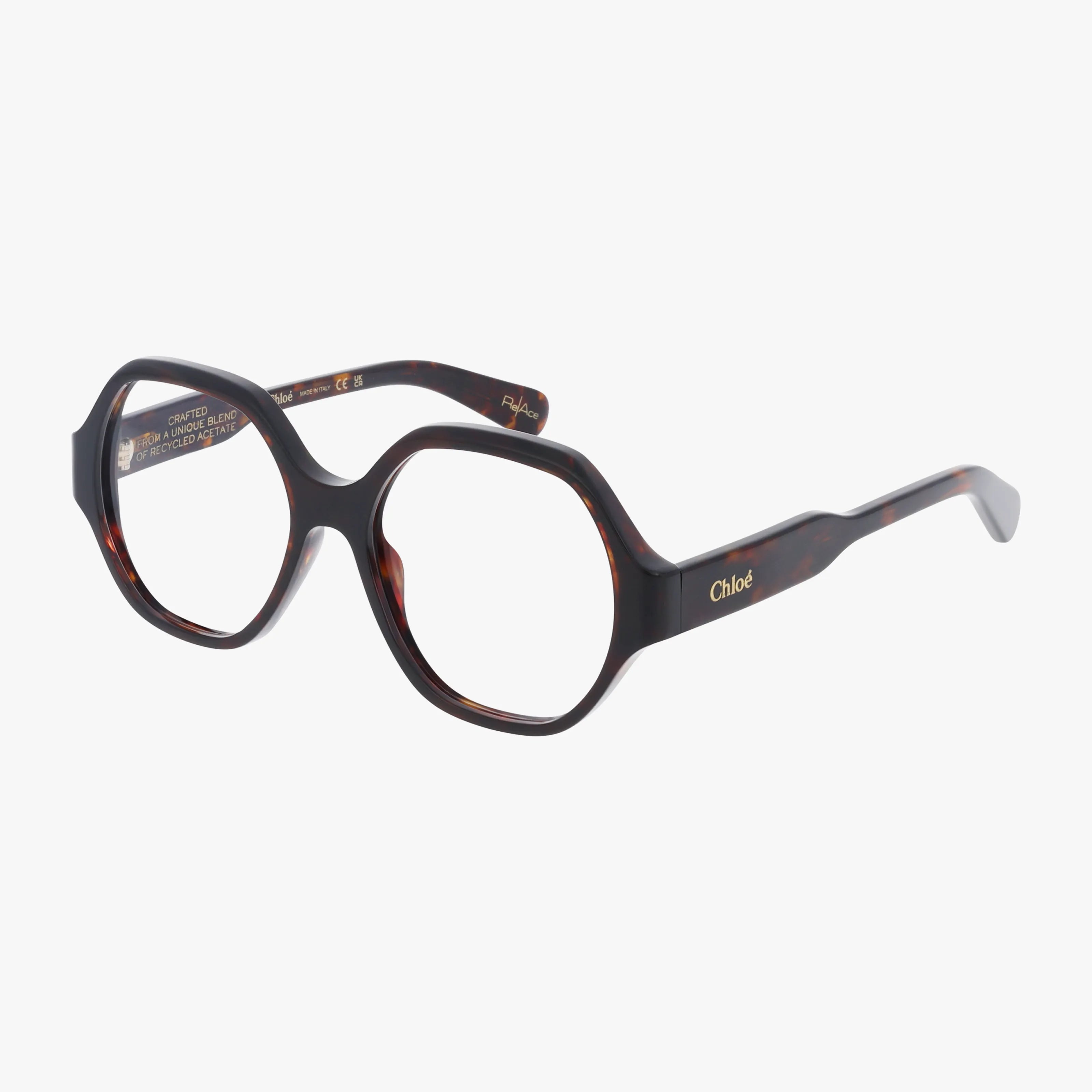 The CH0132O eyeglasses feature a sturdy dark tortoiseshell frame with round oversized lenses and gold “Chloé” branding on the temple for a sleek look.