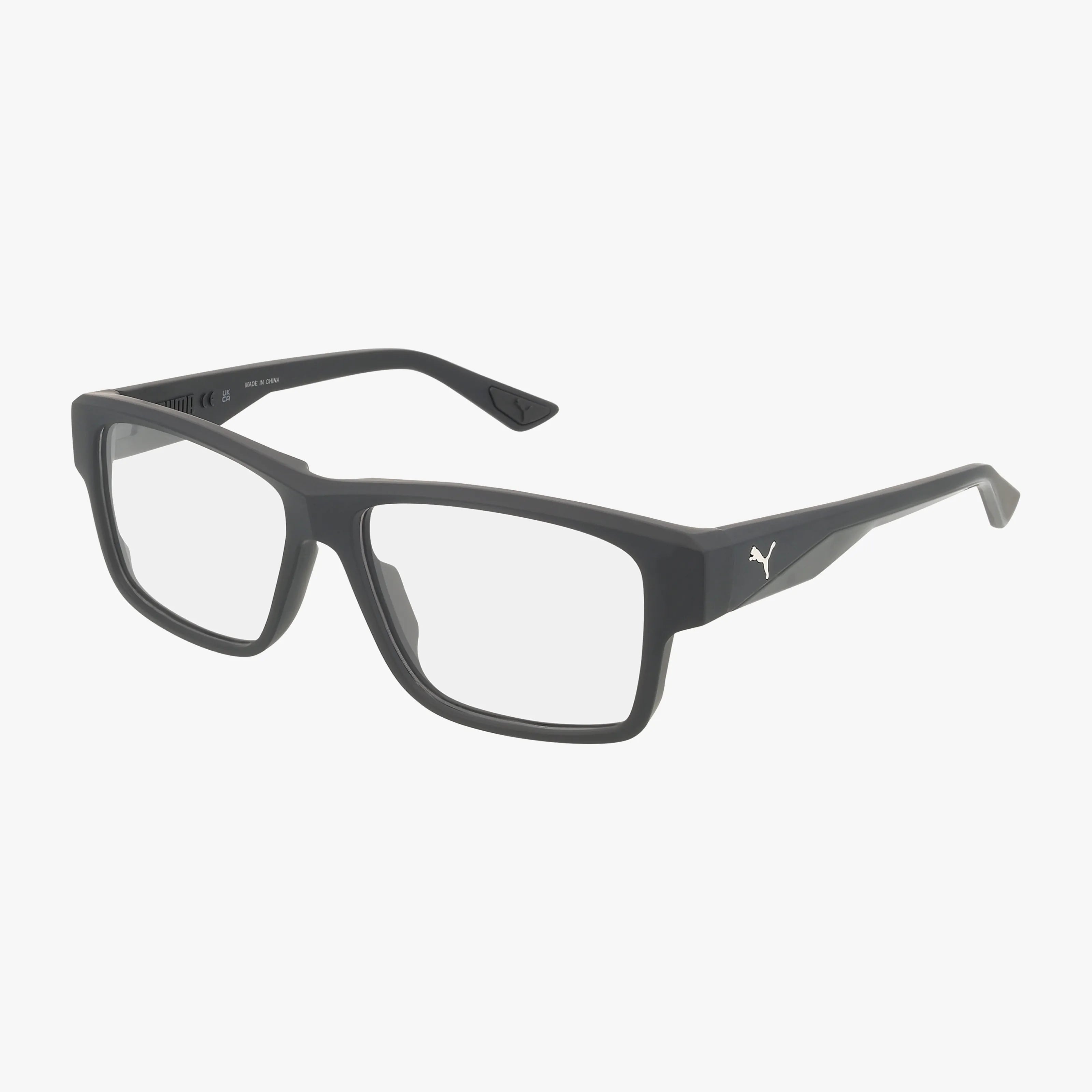 The PU0408O features black rectangular eyeglass frames with clear prescription lenses and a subtle white Puma logo on the temples, all set against a plain white background.