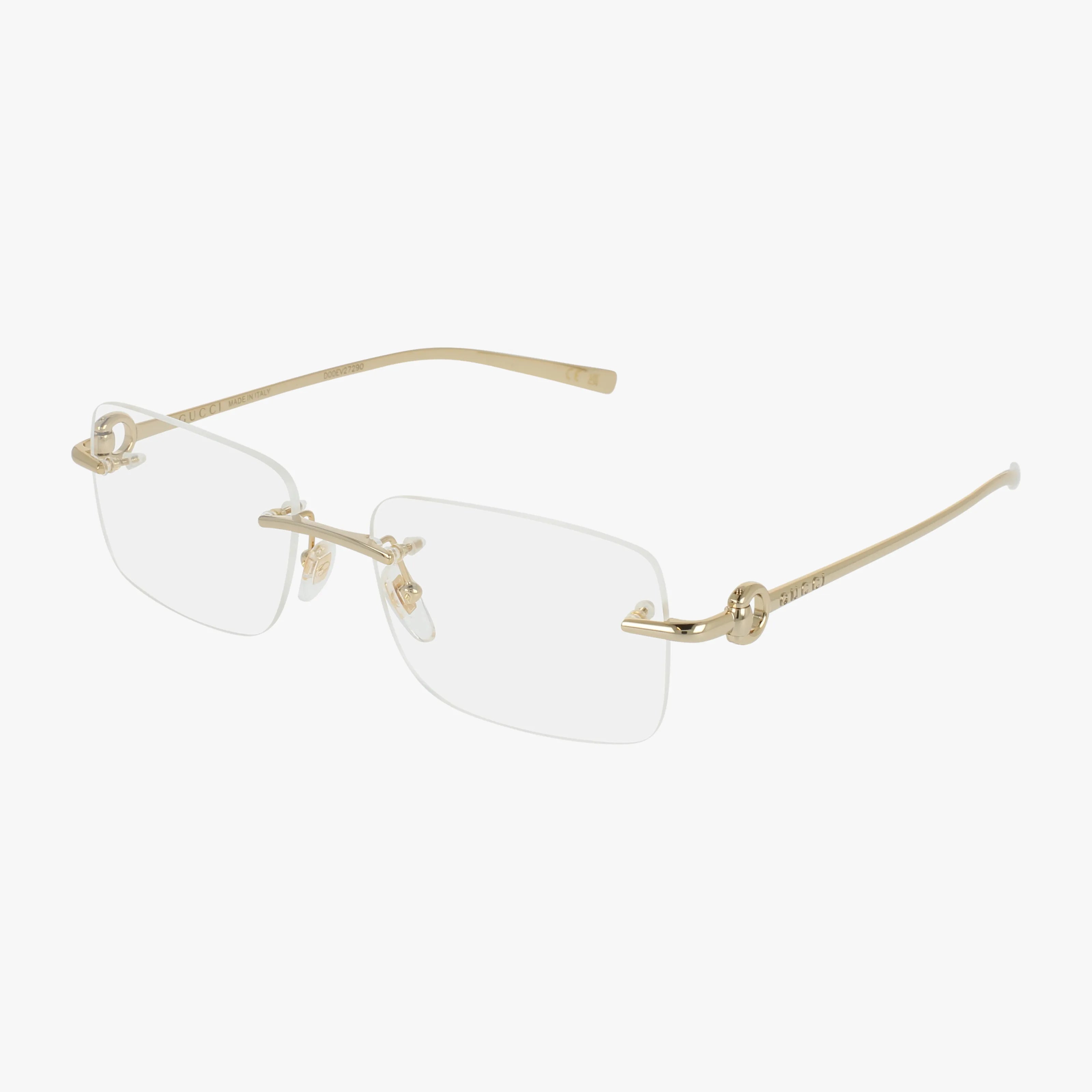 The GG1703O features rimless rectangular clear prescription lenses with thin gold metal arms, a subtle logo on the temples, and a sleek minimalist frame.