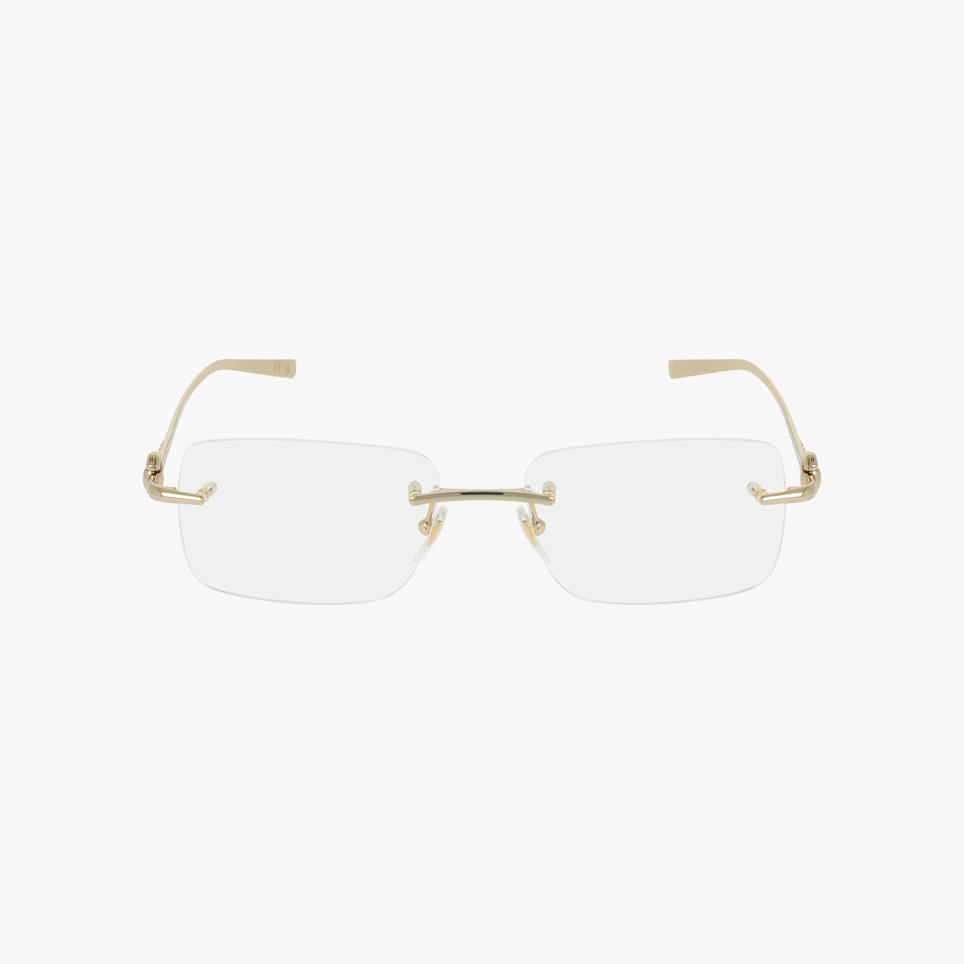 The GG1703O features rimless rectangular eyeglasses with gold metal temples and bridge for a minimalist look and modern durability, shown on a plain white background.