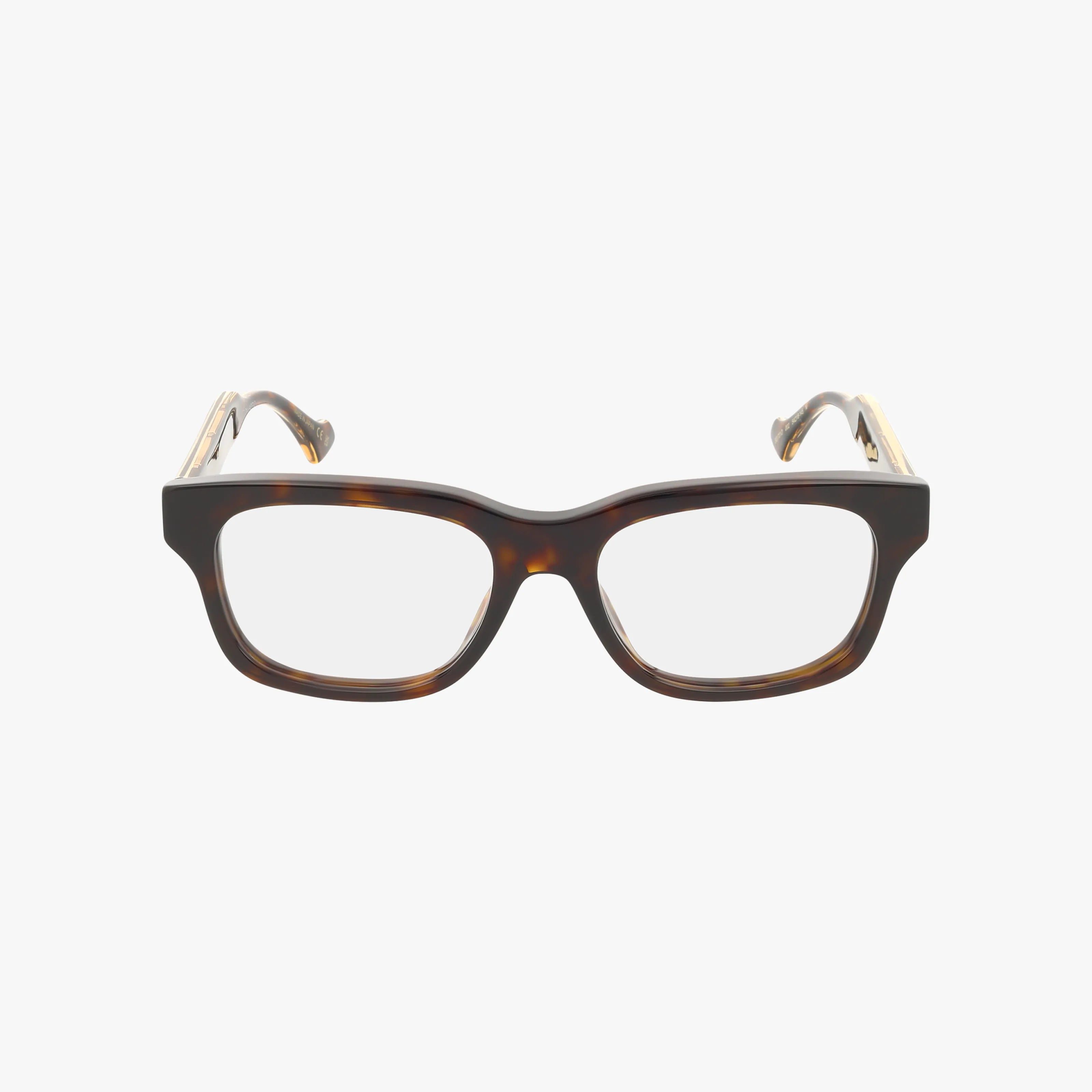 The GG1731O features rectangular eyeglasses with thick dark tortoiseshell frames and clear lenses. Designed for everyday wear, these stylish, resilient frames are showcased against a plain white background.