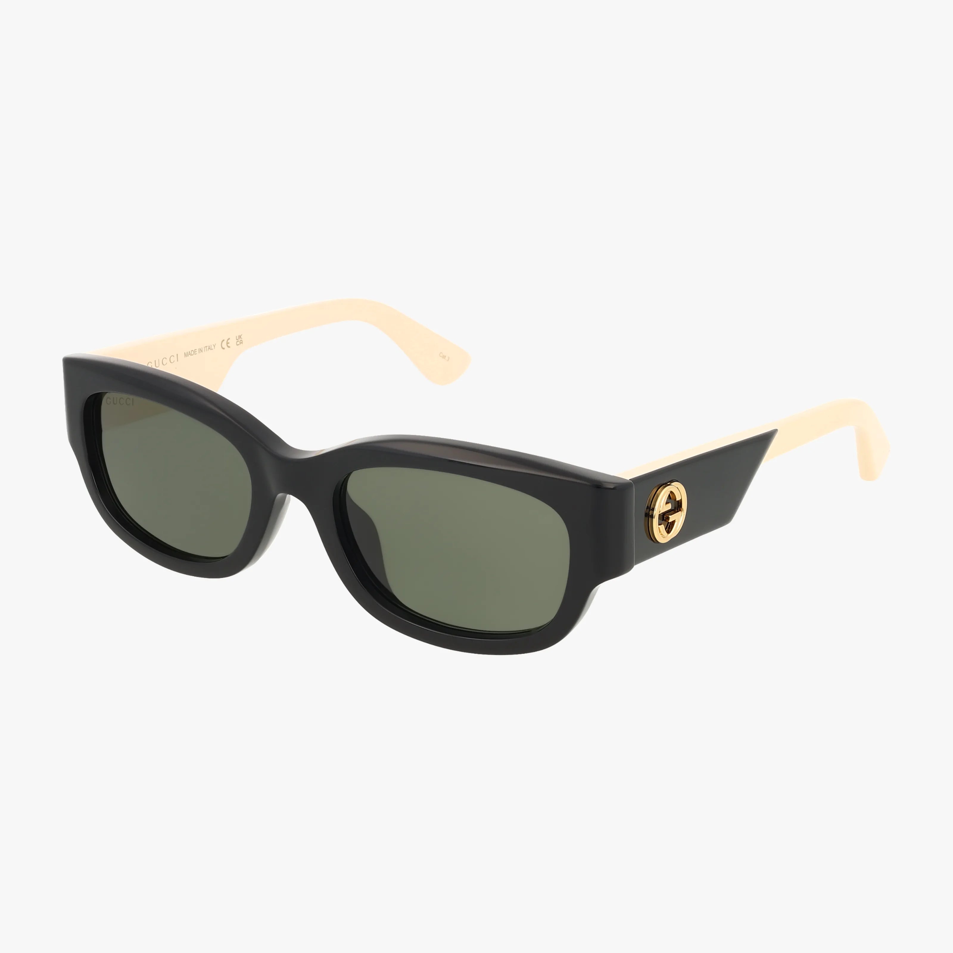The GG1667SK sunglasses feature black rectangular frames, thick beige arms, and a gold circular emblem on the sides; these classic, lightweight shades are shown on a white background.