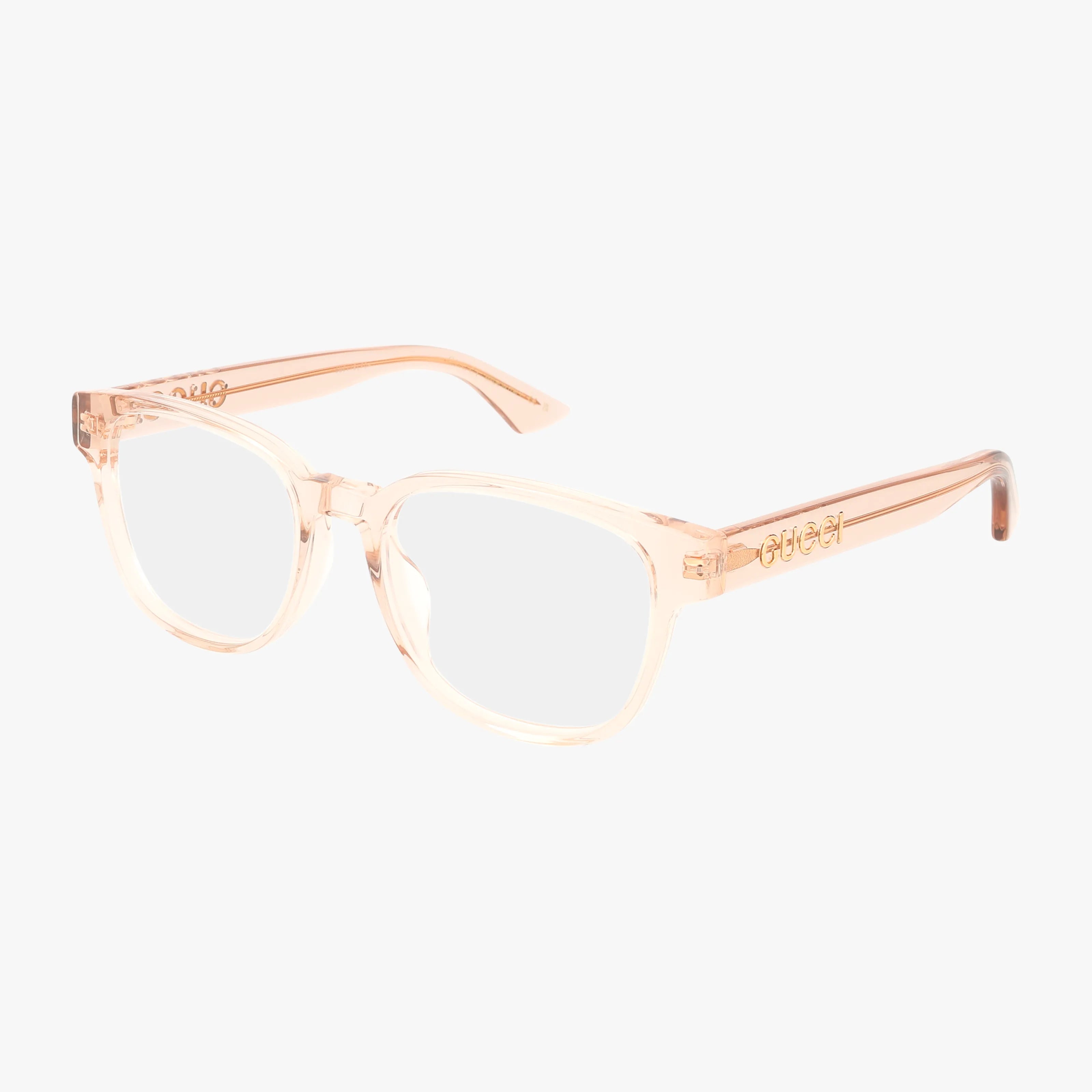 The GG746OA features transparent peach-colored rectangular frames with clear progressive lenses and the Gucci logo engraved on the arms, all set against a white background.