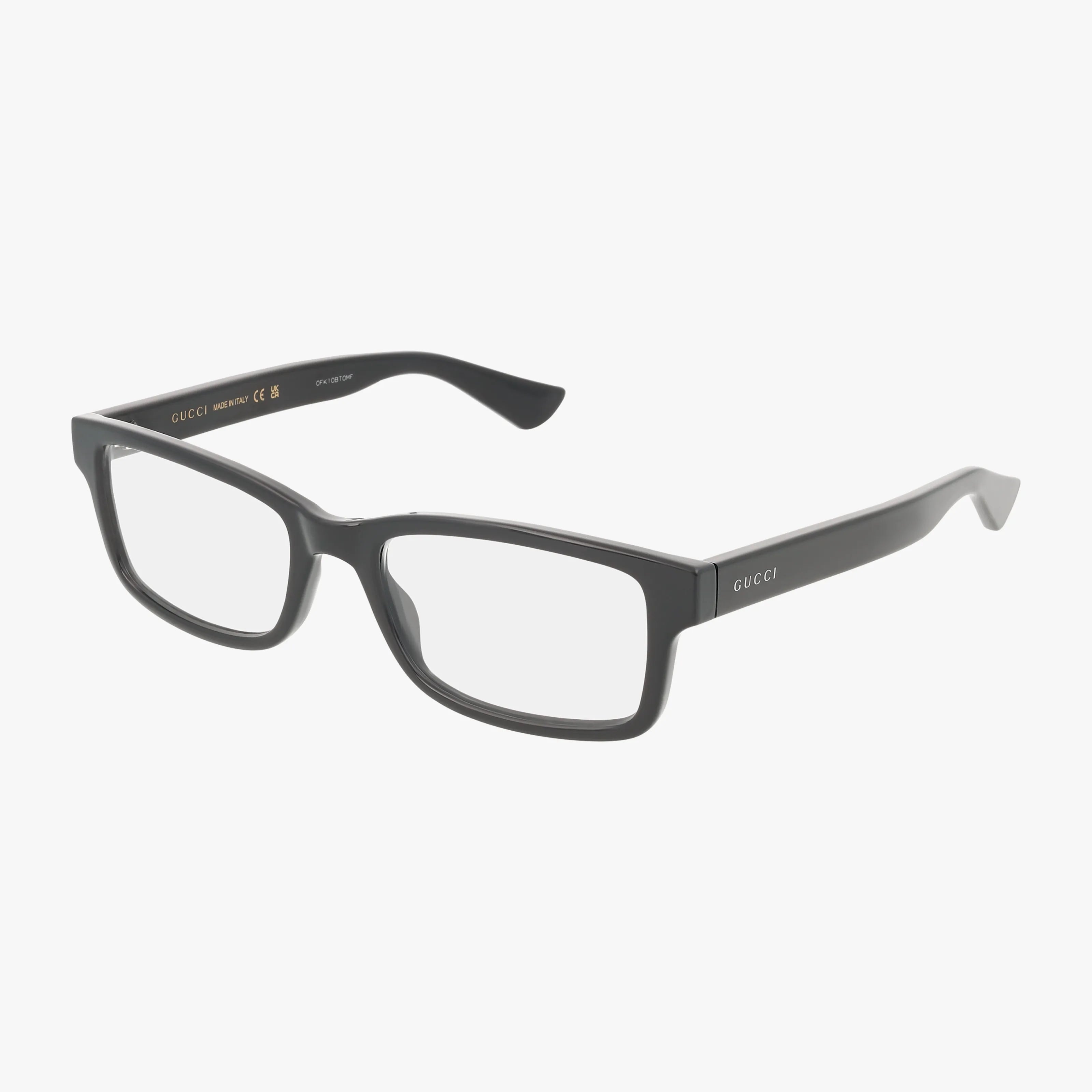 The GG1717O eyeglasses are black, rectangular with clear lenses and thick frames, featuring the Gucci logo on the temple arms. Classic style set against a plain white background.