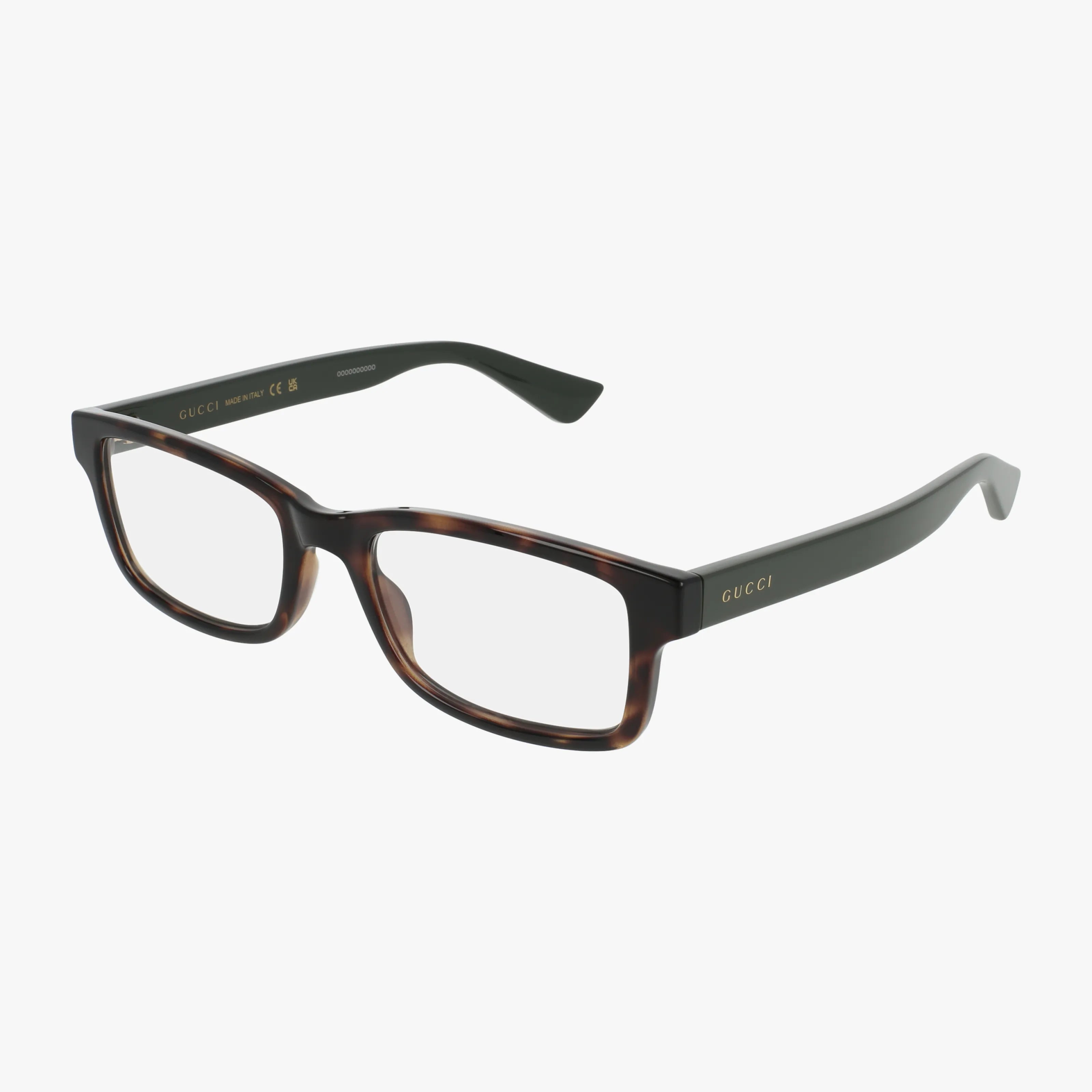 The GG1717O eyeglasses feature rectangular lenses, a brown tortoiseshell frame front, solid black arms with gold Gucci logos, and a lightweight design for classic style, shown on a white background.