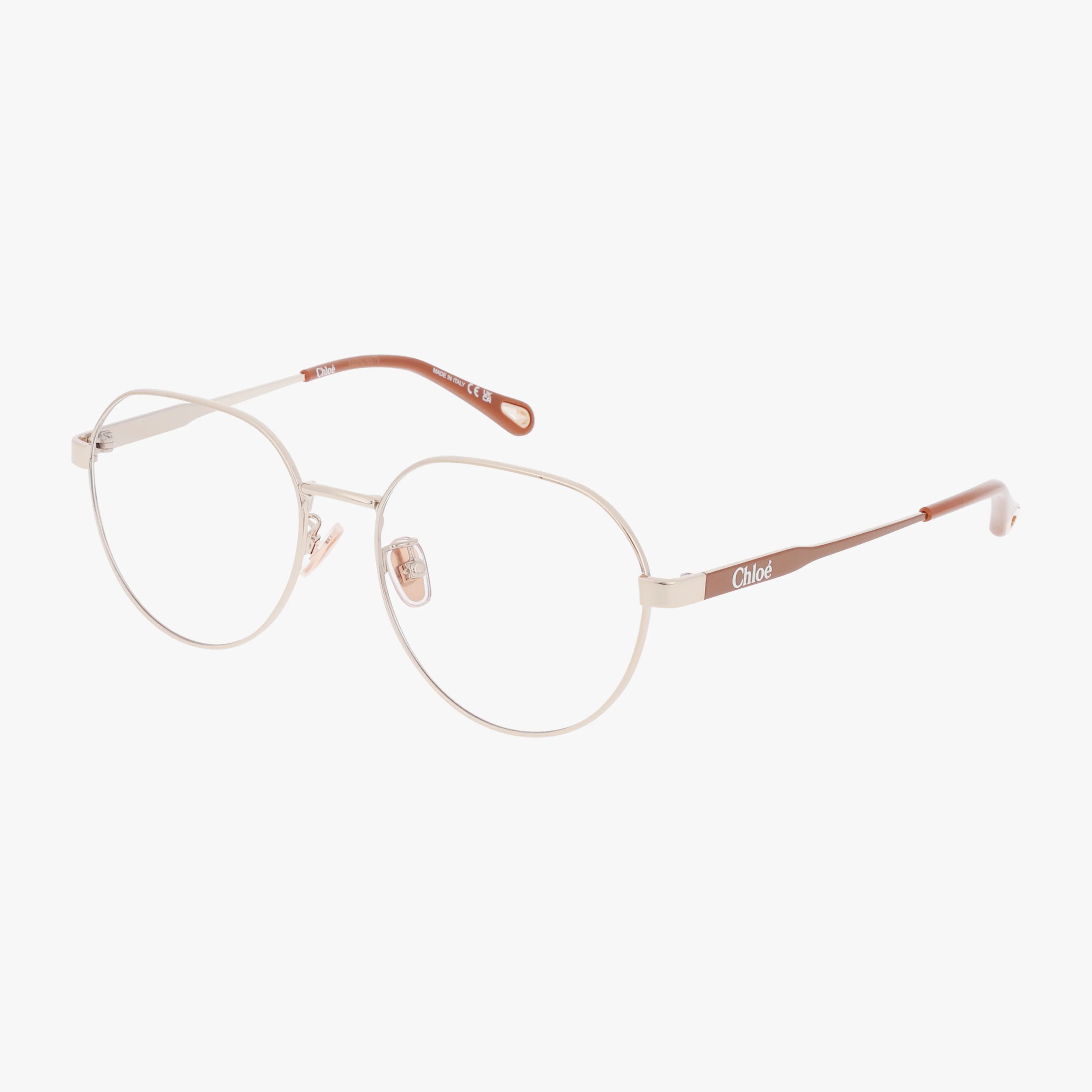 The CH0277OA features gold metal round frames with thin clear lenses and brown temple tips; Chloé branding appears on the side, showcasing bold design and everyday excellence.