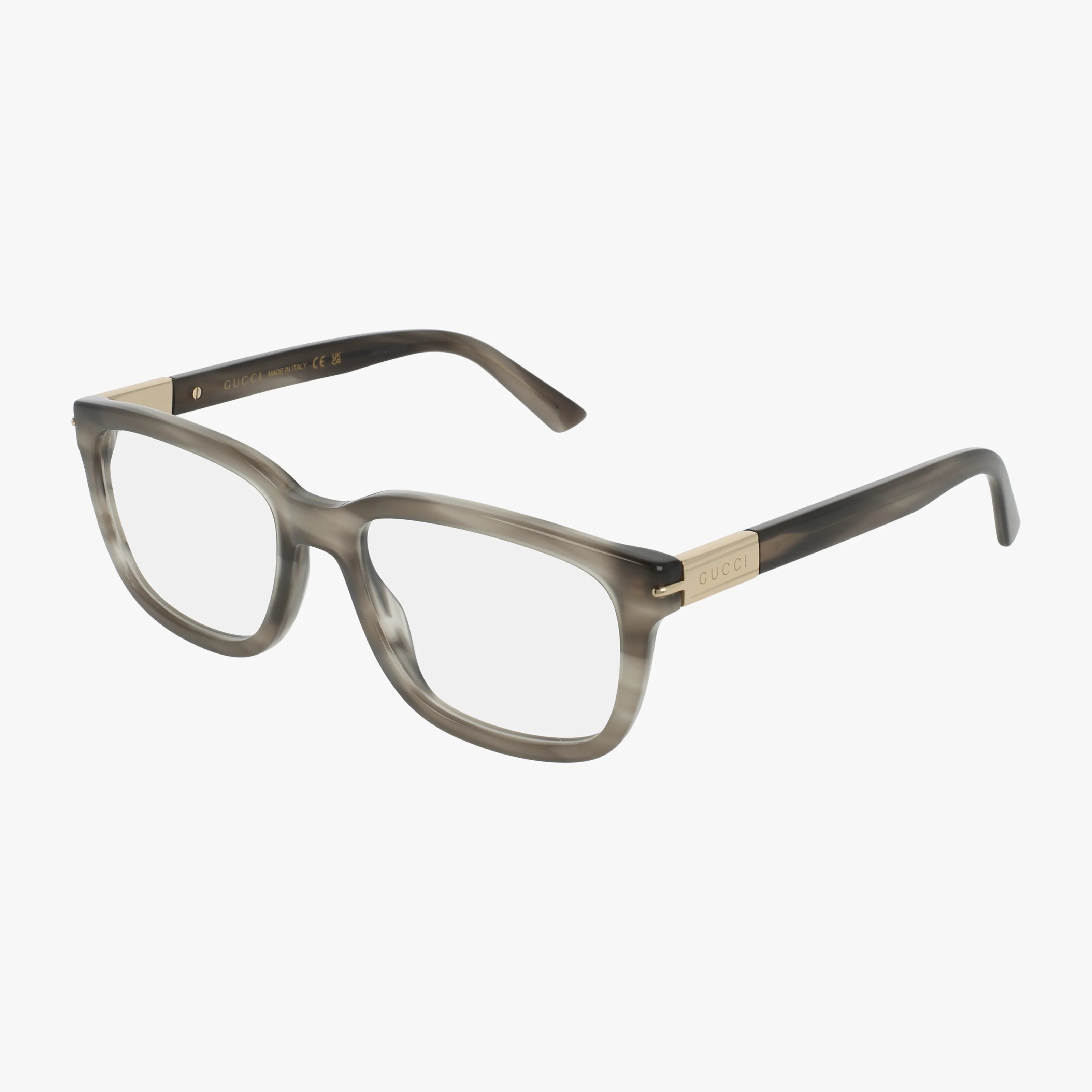 The GG1776O features rectangular translucent gray frames with gold temple accents, embodying bold Gucci design and everyday excellence, displayed on a white background.