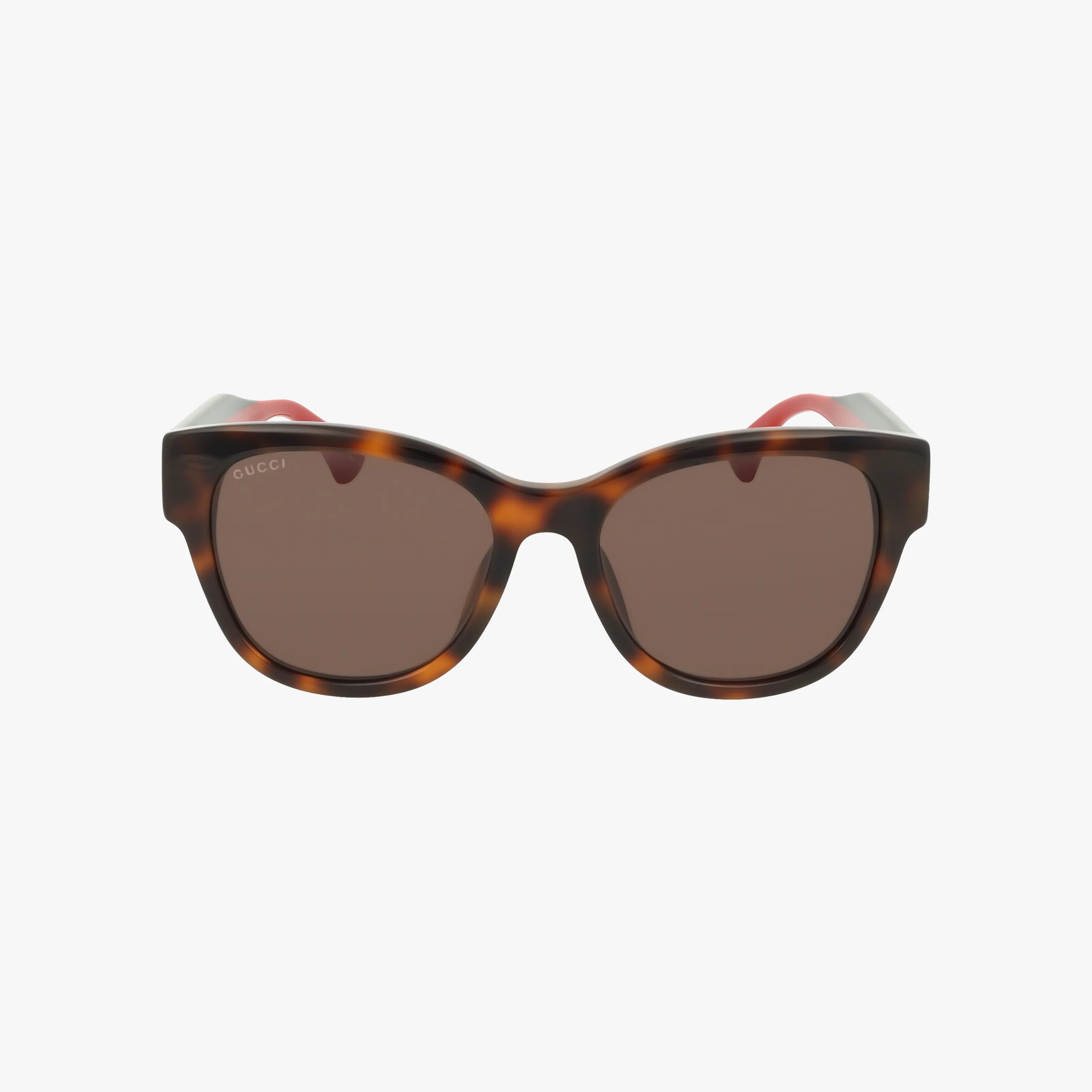 The GG1866SK sunglasses feature a chunky, slightly cat-eye tortoiseshell frame, dark brown lenses, a subtle Gucci logo on the upper left lens, and red accents on the inner arms.