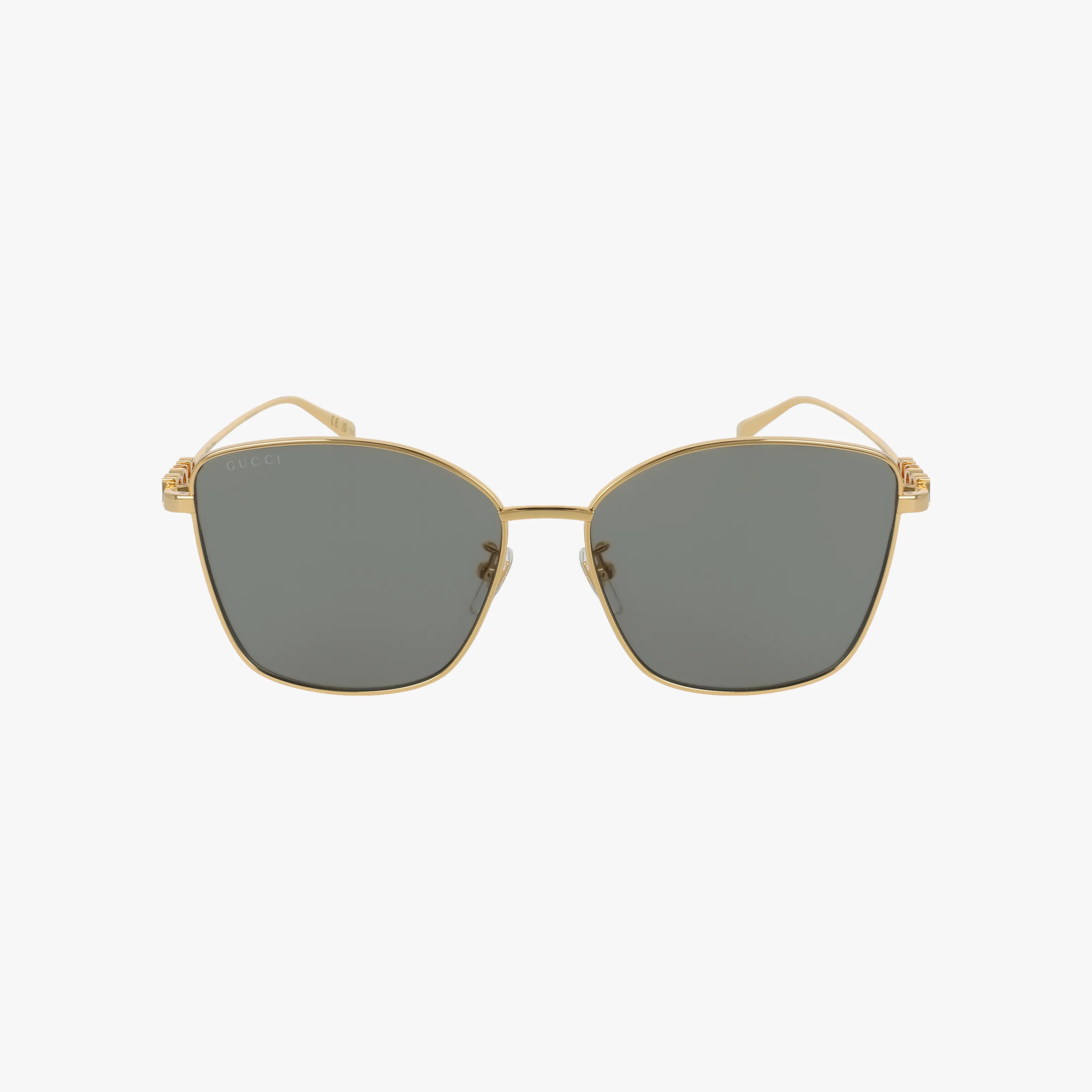 The GG1805SA sunglasses feature gold square frames, dark lenses, and slim arms in a minimal design, delivering stylish sun protection. Displayed on a plain white background.