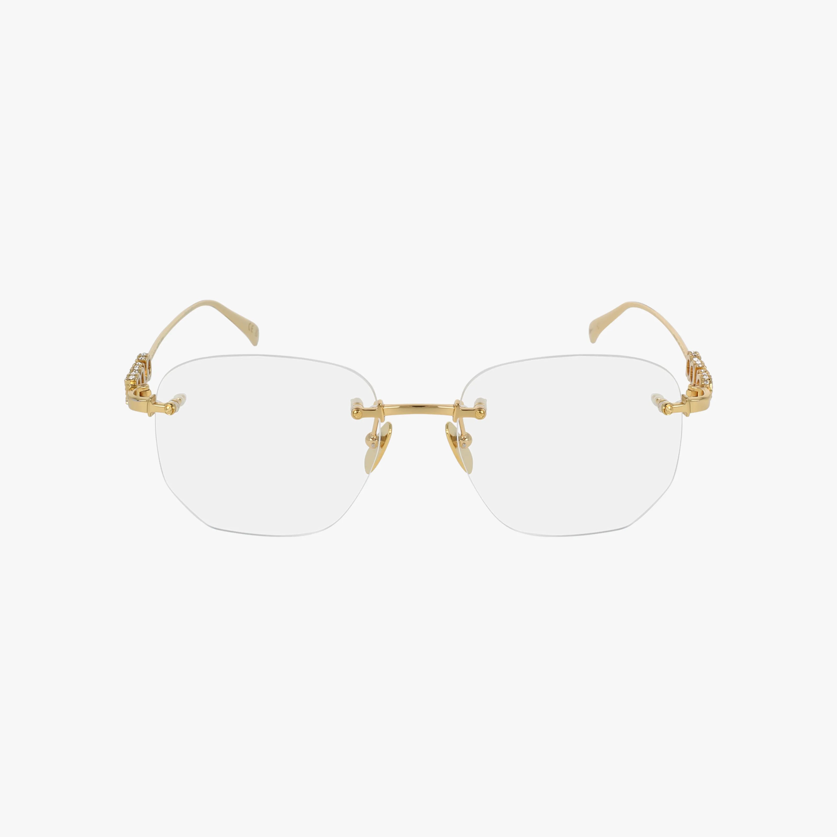 The GG1806O rimless eyeglasses feature rectangular clear prescription lenses and gold metal temples, hinges, and nose pads for a versatile look, shown on a white background.