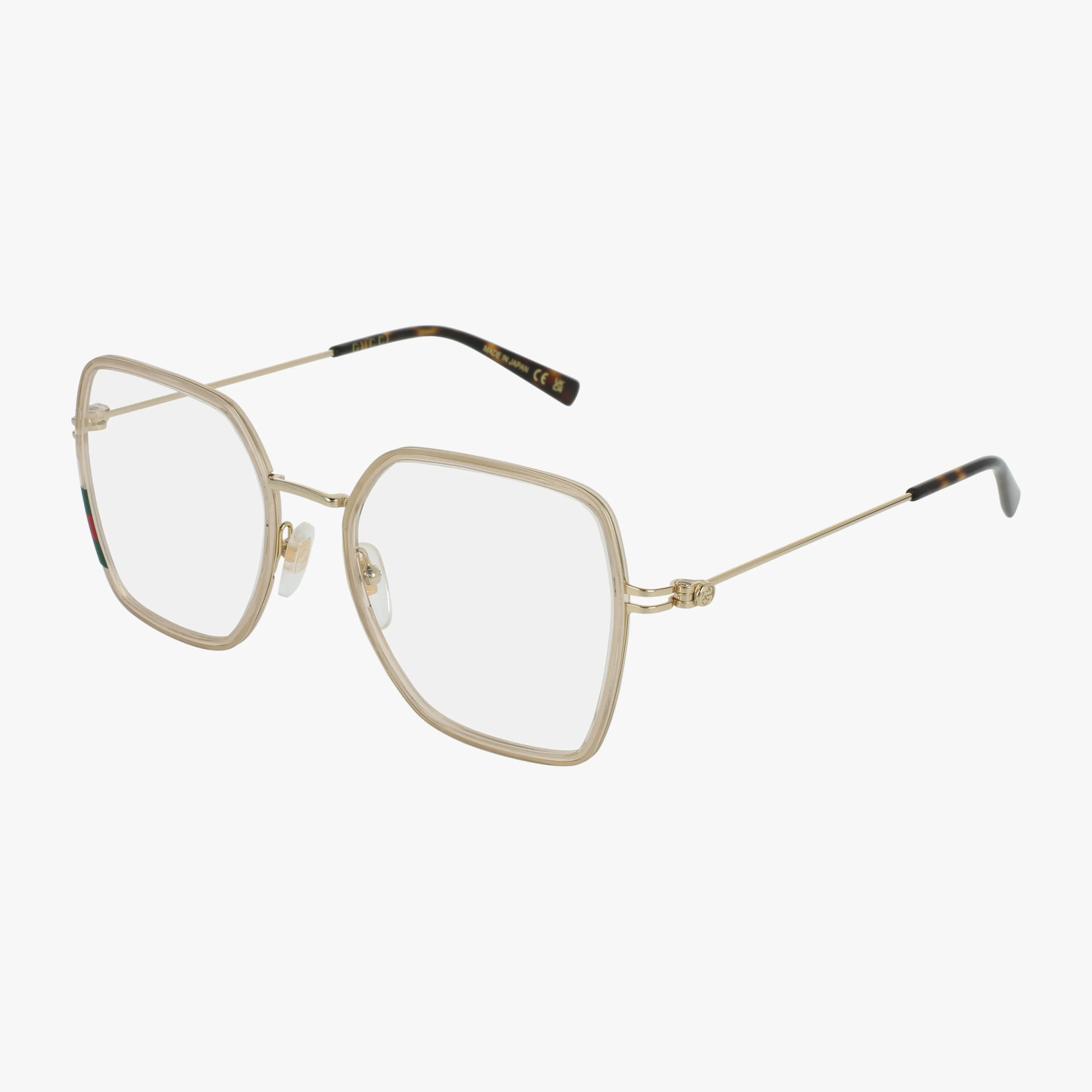 The GG1850O features gold frames with large, geometric, slightly rounded square lenses, thin arms, and black tips—offering a modern tailored design. Perfect for stylish eyewear seekers. Displayed on a plain white background.